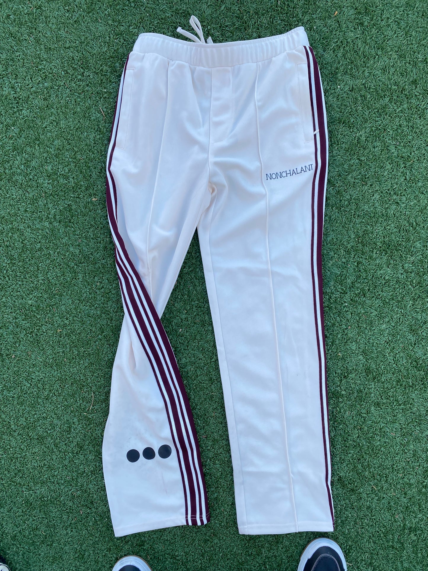 NONCHALANT TRACK PANTS