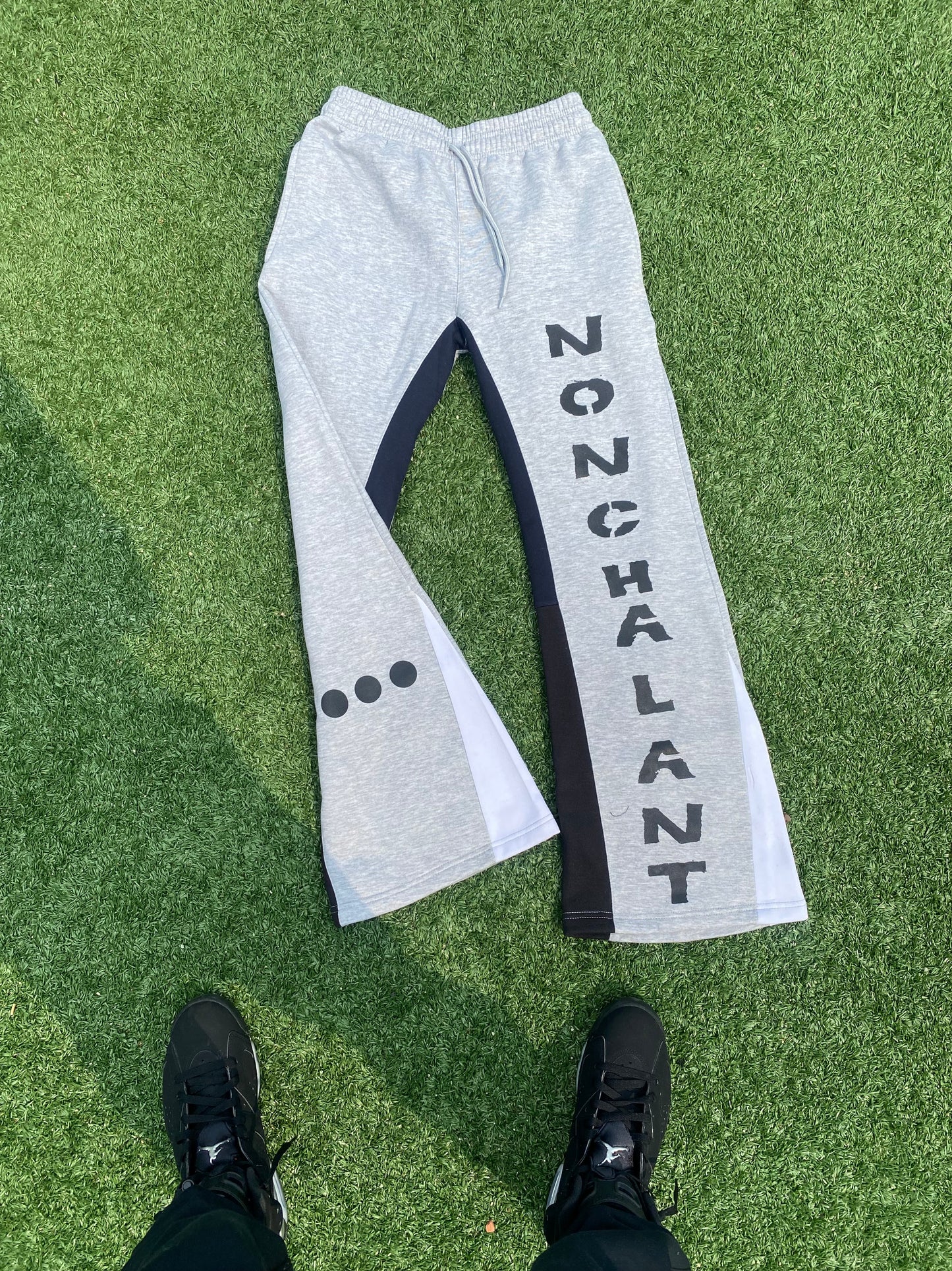 NONCHALANT FLARE SWEATPANTS